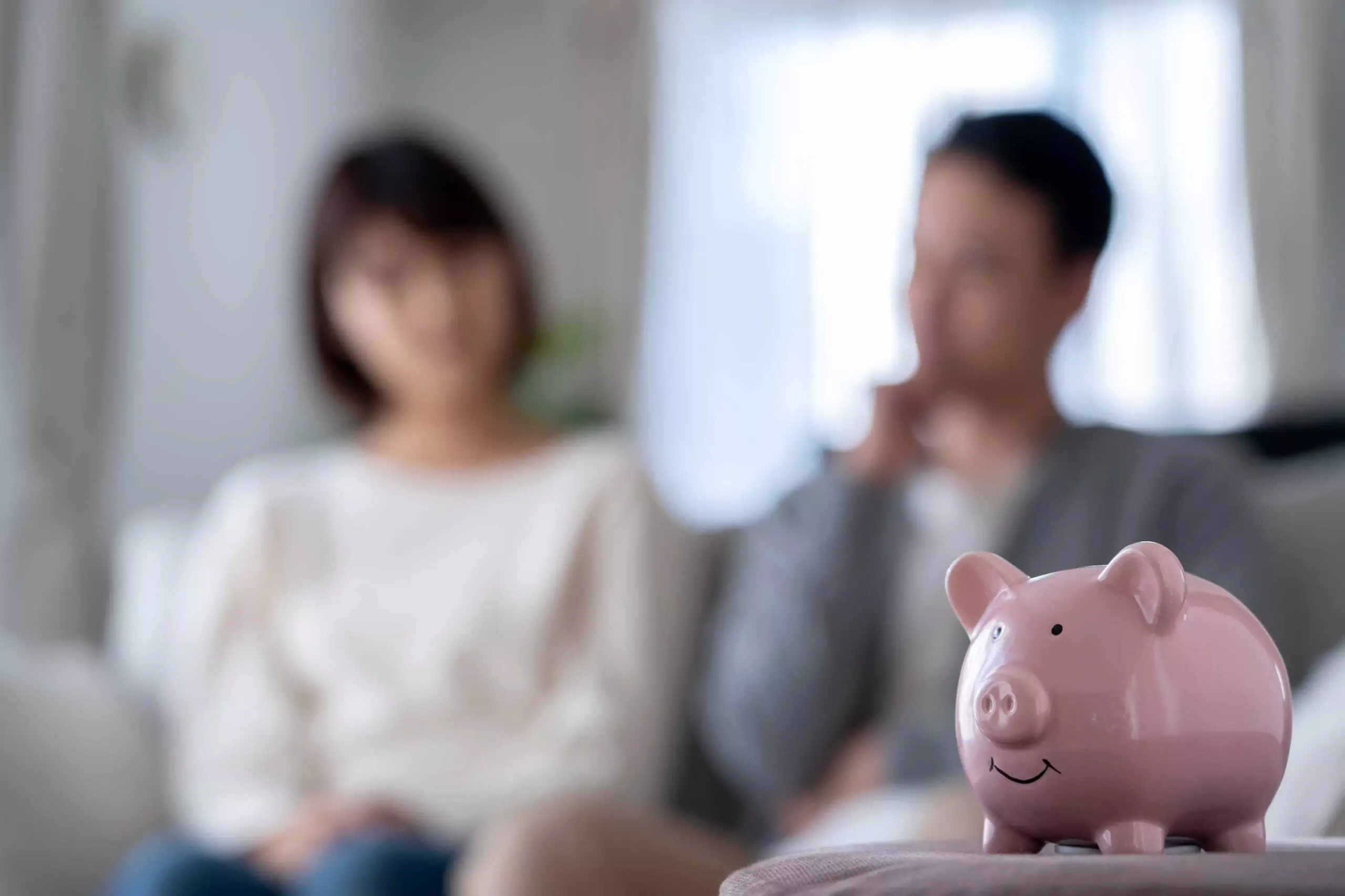 Two people thinking about their gutter investment